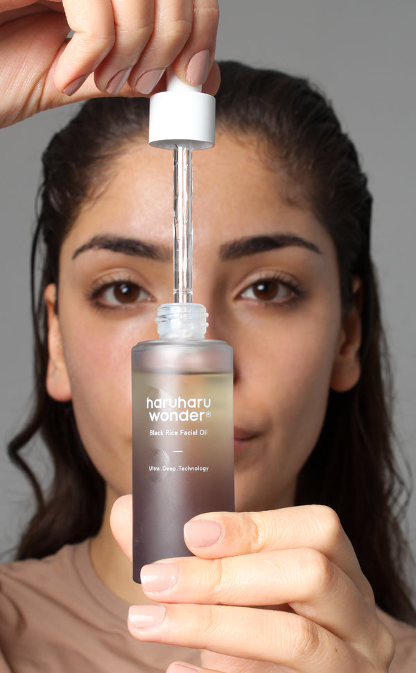 Huile visage riz noir